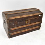 A late 19th century wooden faux leather dome-topped chest with lath binding, 48 x 81 x 47cm.