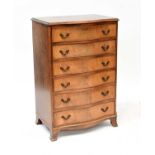 A reproduction walnut and burr walnut crossbanded bow front chest of six long graduated drawers,