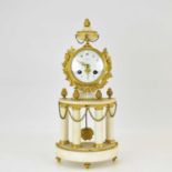 A late 19th century French gilt metal and alabaster chiming mantel clock in the Classical style,