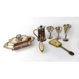 A good quantity of mainly silver plated items to include chalices, entrée dishes, flatware,