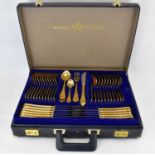 BESTECKE SOLINGEN; an eighty-two piece gold plated cutlery set to include an additional loose twelve