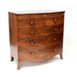 A Victorian mahogany bow-fronted chest with two secret drawers above two short over three long