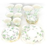 A twenty-one piece Royal Grafton Art Deco inspired bone china tea service comprising six cups, six