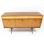 A 1960s Wrighton sideboard with three satinwood drawers above three linear inlaid cupboard doors, on