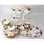 ROYAL ALBERT; an 'Old Country Roses' tea service and part dinner service comprising teapot (