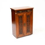 An Edwardian mahogany carved side cupboard with frieze drawer above pair of cupboard bases, 89 x