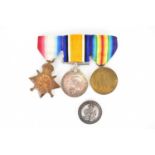 A trio of WWI medals awarded Gnr. H. G. Atkins (Henry Charles) RA no.17494, Defence, War Medal and