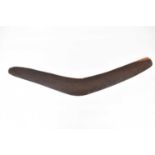 A mid-20th century Australian boomerang with textured surface, length 68cm.Condition Report: The was