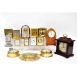 A quantity of modern clocks to include carriage clocks, a Junghans automatic clock, ships' clocks, a