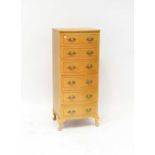 A reproduction French-style bow front and painted chest of six drawers, on cabriole legs, 113 x 48 x
