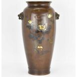 A Meiji period Japanese bronze vase of ovoid shape, decorated with floral designs with birds,