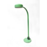 A mid-20th century green enamelled standard lamp, with arched support and domed shade, height