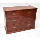 An Edwardian chest of two short and two long drawers, on plinth base, width 107cm.