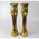 A pair of shell case 'Trench Art' vases, height 37.5cm (2).