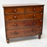 A Victorian mahogany chest of two short and three long drawers, raised on bun feet, width 114cm.
