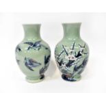 A pair of Fukuyama period Japanese baluster vases, celadon ground with flow blue decoration of