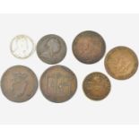 Seven various tokens and coins to include a Jackson & Listers Warehouse one penny token, Crystal