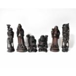 Three pairs of c.1900 carved wooden Oriental figures, height of tallest 35cm.