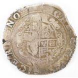 A Charles I hammered silver half crown, mint mark possibly MM and crown, date suggested 1635.