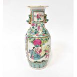 A late 19th century Chinese Famille Rose baluster vase with overall floral decoration, figural