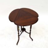 A reproduction mahogany triangular-topped wine table with three D-end drop flap, three square and