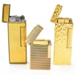 Three 1970s gold plated lighters to include a Dunhill example and a Maxim example (3).