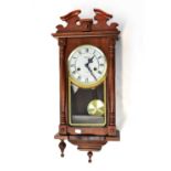 LINCOLN; a mahogany cased eight-day wall clock, the white dial set with Roman numerals, with glass