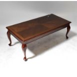 A reproduction mahogany rectangular coffee table, to baluster supports, 42 x 120 x 60cm.
