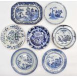 Four 19th century Chinese porcelain plates, diameters 23.5cm and 25cm, an oval dish, length 30cm,