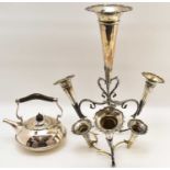 A 19th century silver plated seven-branch epergne with seven trumpets with wavy rims and tapered