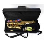 ARTEMIS; a cased brass alto saxophone.