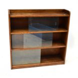 A mid-20th century oak three-section bookcase with twin glazed doors to each section, 91 x 91.5 x