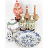 Eight items of Oriental ceramics, to include a 19th century blue painted Chinese plate with floral