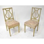 Four early 20th century painted French dining chairs with lyre backs and pink and white