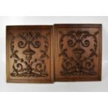 A pair of French walnut panels carved with scrolls and foliate design, 53 x 44cm (2).