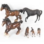 BESWICK; six collectible horse figures comprising two brown gloss shire horses, a matte 'Black