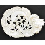 A late 19th/early 20th century Chinese pierced and carved mother of pearl shell, decorated with