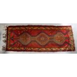 A Kurdish Sumac hand-knotted rug, 290 x 100cm.