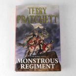 TERRY PRATCHETT; a Discworld novel 'Monstrous Regiment', bearing the signature of the author,