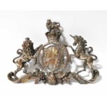 A cast silvered metal royal coat of arms, width 28.5cm.