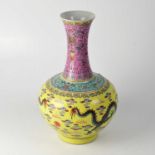 A 20th century Chinese Famille Jaune baluster vase with slender pink and turquoise neck with