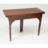 A mahogany fold-over gateleg tea table raised on square tapering supports, 71 x 101 x 42cm.Condition