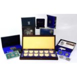 DANBURY MINT; a cased set of twelve proof silver ingots 'The Royal Arms', produced in celebration of