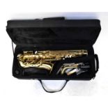ARTEMIS; a cased brass alto saxophone.