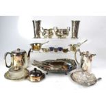 A group of silver plate including flatware, swing-handled basket, hotel pot, cruet, etc.