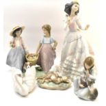 LLADRÓ; four boxed porcelain figures comprising a large figure of a lady in crinoline dress,