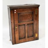 A George III oak hanging cabinet with three shelves and single drawer to the interior, 85 x 67.5 x