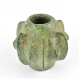 A Medieval period Near Eastern Luristan-style bronze mace head, undated, the mace head with six D-