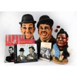 A large Laurel and Hardy resin double bust, a bust of a Native American and three books relating