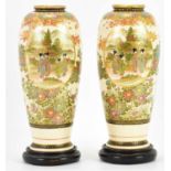 A pair of 19th century Satsuma vases of ovoid form, each with panel of geishas with pagoda and